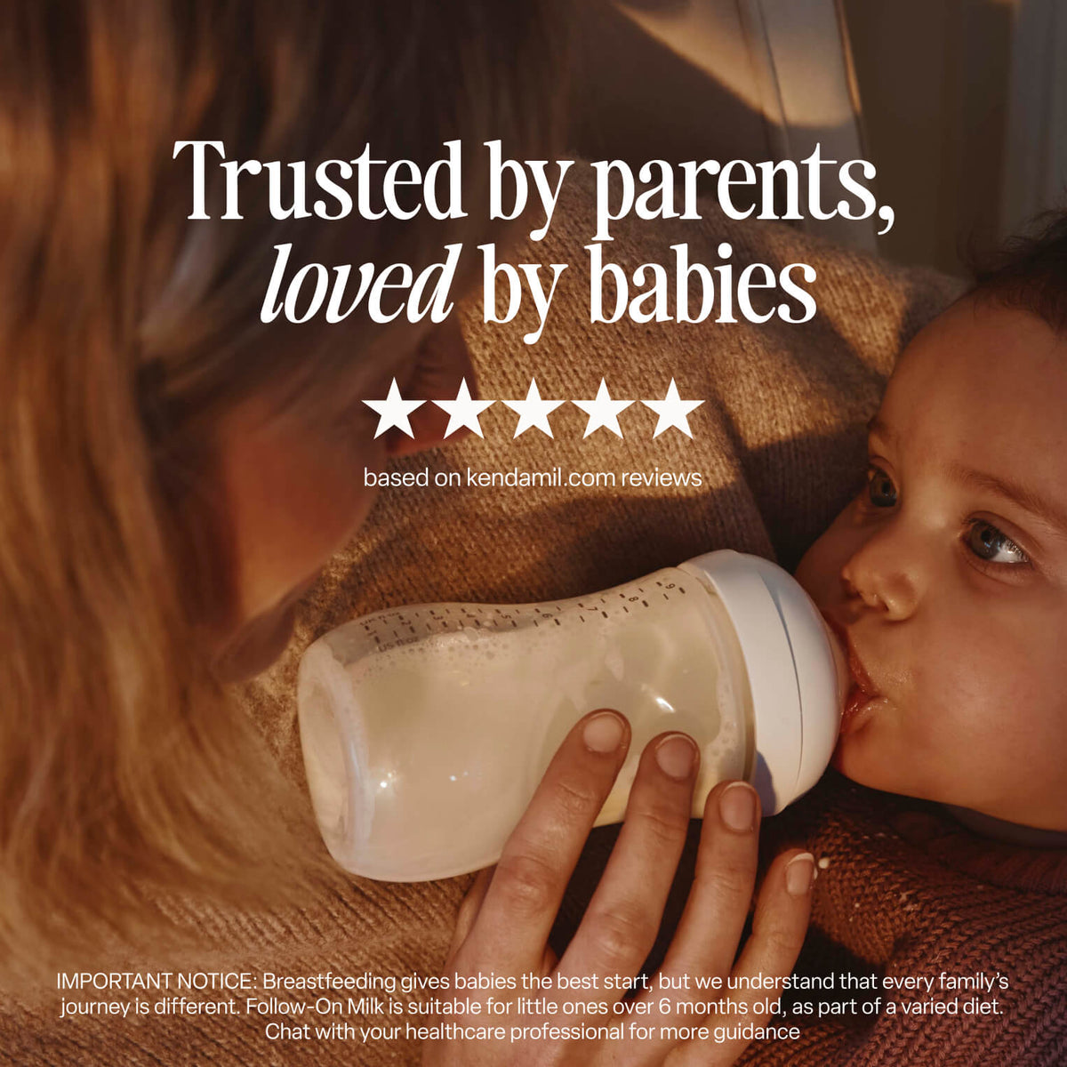 A woman holds a baby who is drinking from a bottle. Text reads, Trusted by parents, loved by babies, with five stars and a note about Kendamil.com reviews. Small text gives an important notice about breastfeeding and follow-on milk. Highlighted in the image is that Organic Toddler Milk is made with ingredients sourced from grass-fed cows.